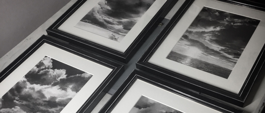 Four framed charcoal drawings